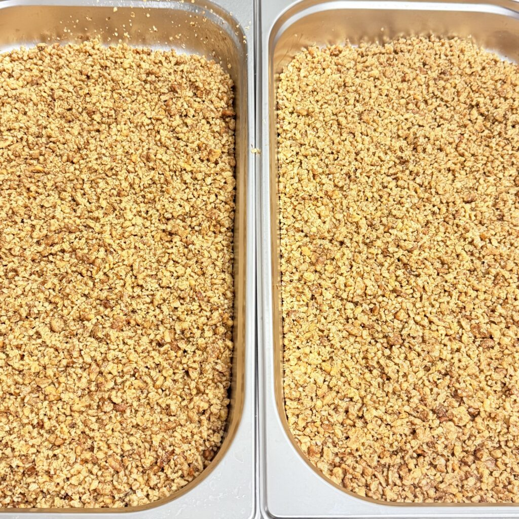 Chopped walnuts in trays in the 4 Tastes workshop